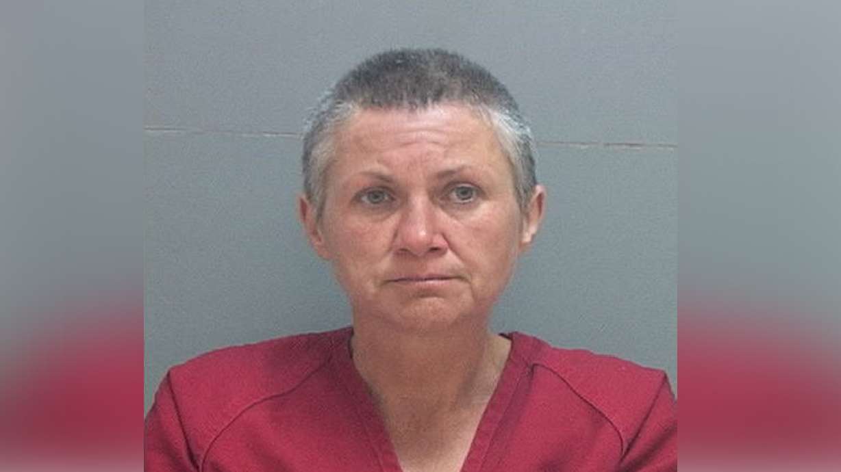 Daughter charged with murder in fatal house fire that claimed mother