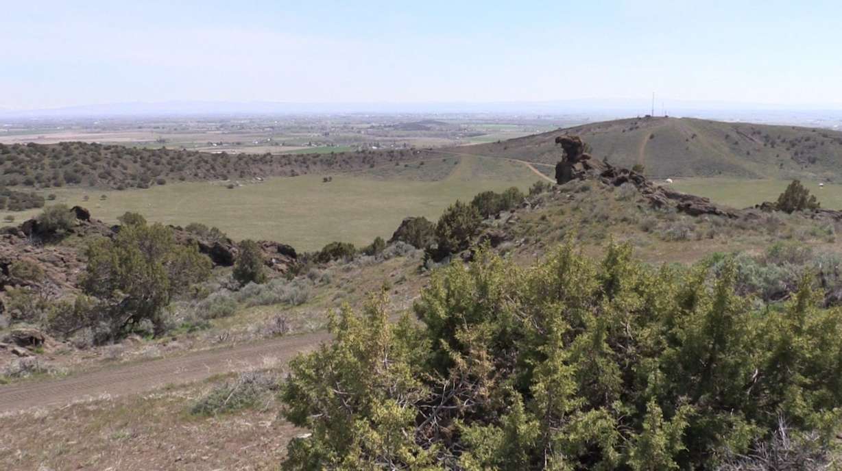 Millions of people are expected to watch a total eclipse just before noon on Monday, Aug. 21, 2017. For some, they'll be watching it atop old volcanic craters in Menan, Idaho. The twin volcanic craters, South Menan Butte and North Menan Butte, are very nearly on the centerline of the path of totality. (Photo: John Hollenhorst, KSL TV)