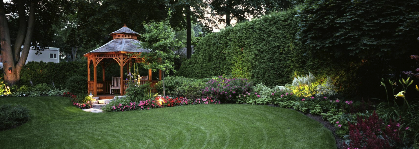 You may not be able to add an entire gazebo, but flowering color and yard lights are an easy update