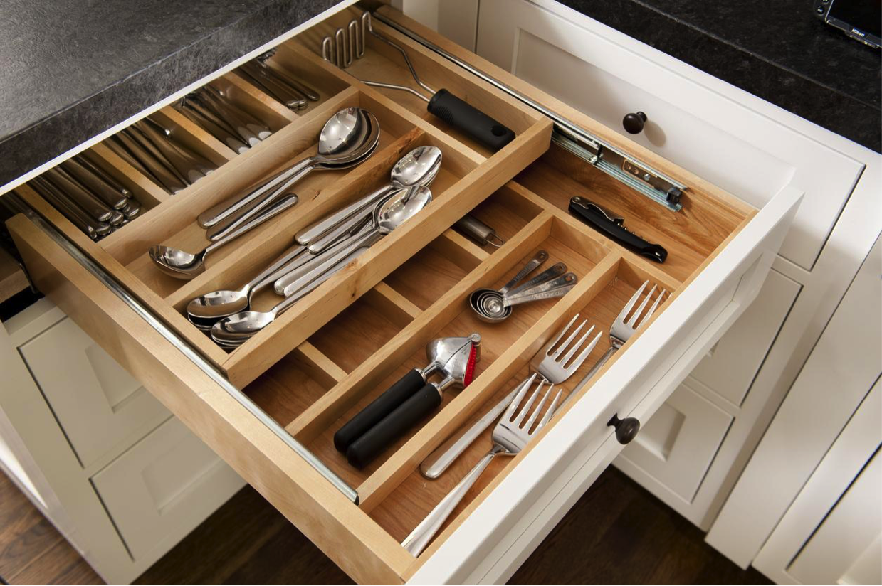 Hardwood drawer inserts adds an element of luxury to any kitchen