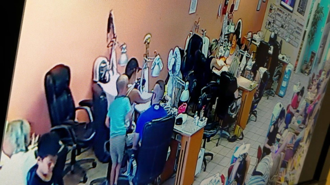 A surveillance image from Friday, June 2, 2017, shows Memorez Rackley, 39, at Jade Salon in Sandy while James Patterson, 32, attempts to talk to her as Jase Rackley, 6, looks on. Patterson shot and killed Memorez and Jase Rackley on Tuesday, June 6, 2017, before taking his own life. (Photo: Jade Salon)