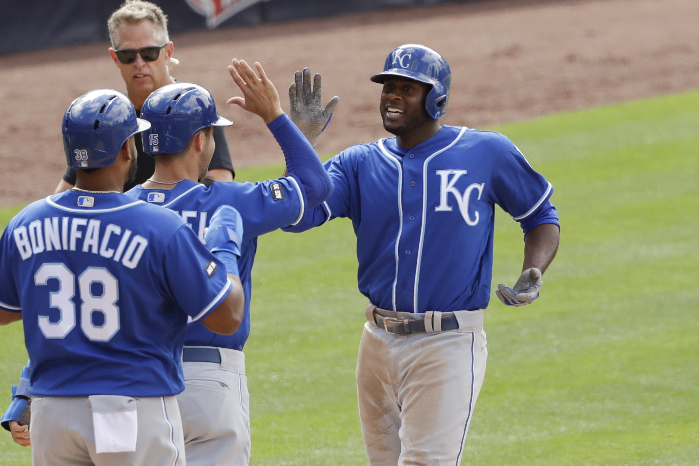 Cain hits 2 HRs, slam in 9-run 8th leads KC over Padres 12-6