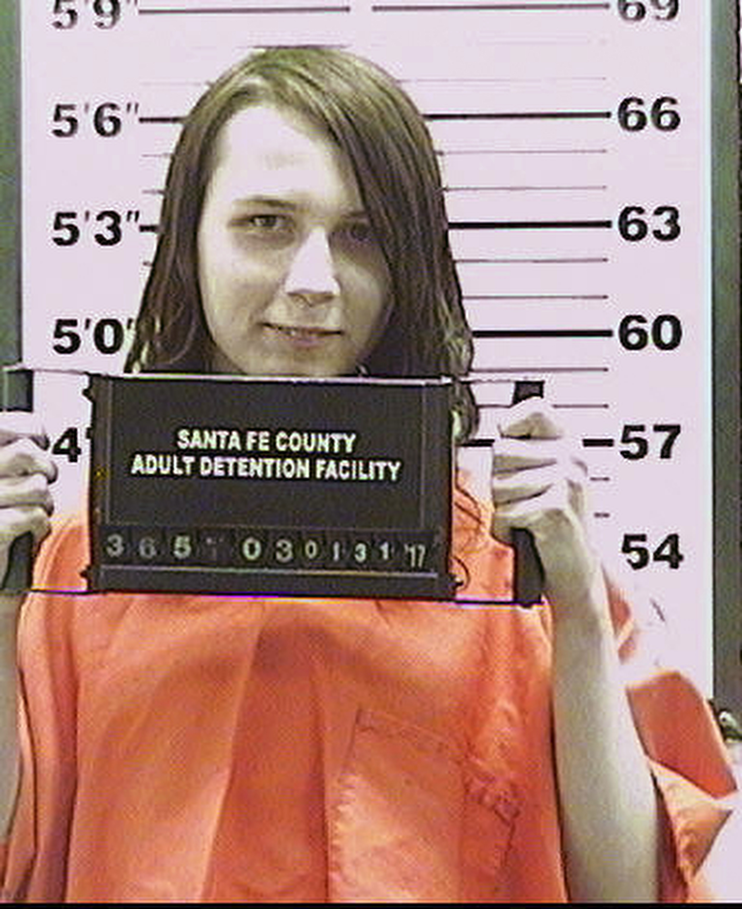 Police video shows rescue of kidnap victim bound by chains