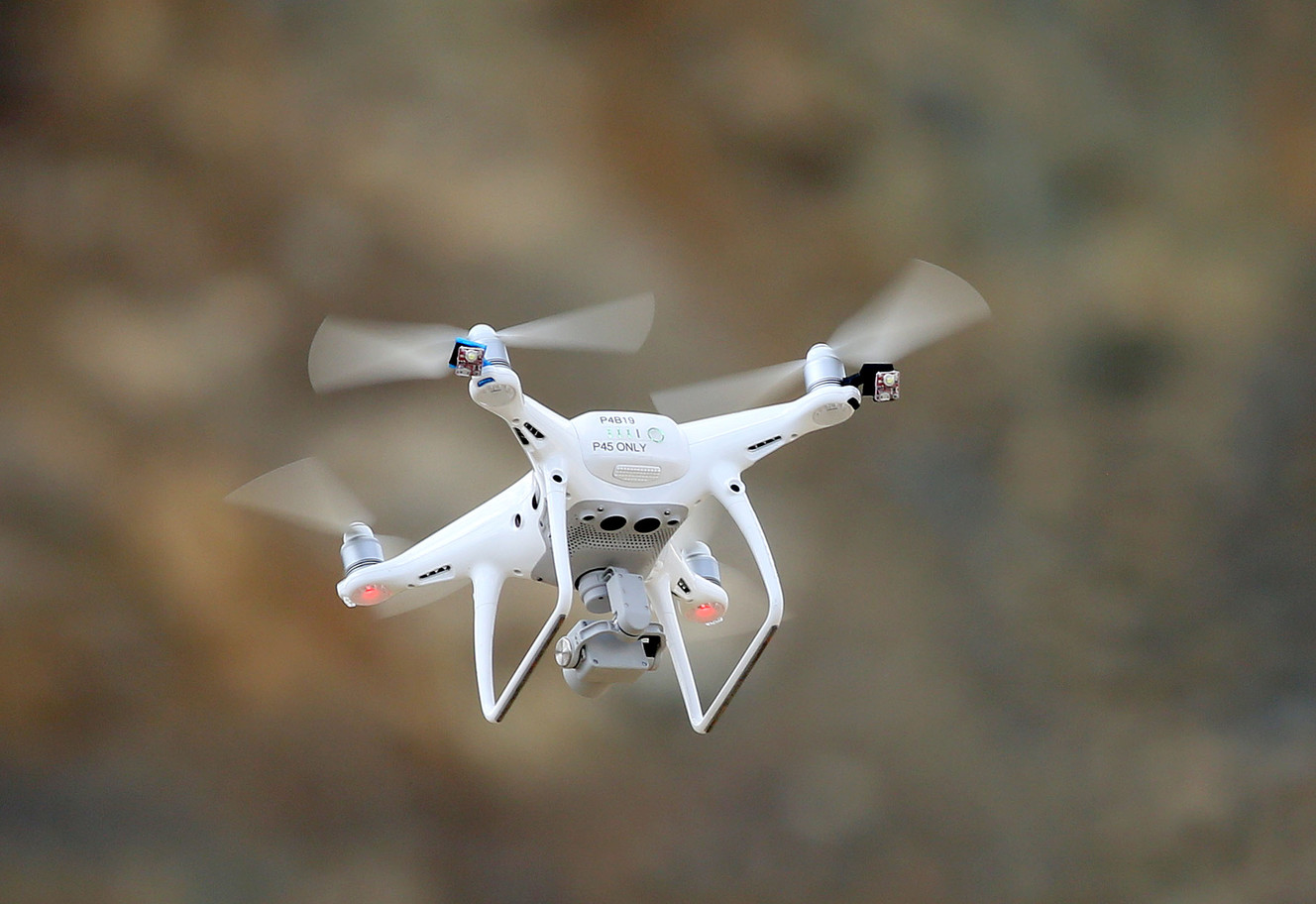 Workers at Rio Tinto Kennecott uses a DJI Phantom 4 Pro drone to improve safety and business efficiency at the Bingham Canyon Mine on Wednesday, June 14, 2017. (Photo: Kristin Murphy, Deseret News)