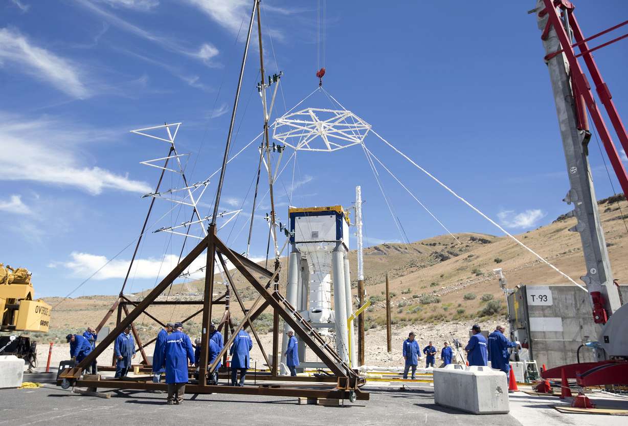 Technicians adjust the positions of the acoustic arrays before launching the abort motor that will be used for NASA’s Orion spacecraft at the Orbital ATK facility in Promontory on Thursday, June 15, 2017. Orion will carry crew and launch on NASA’s heavy-lift Space Launch System, enabling new missions of exploration across the solar system. (Photo: Laura Seitz, Deseret News)