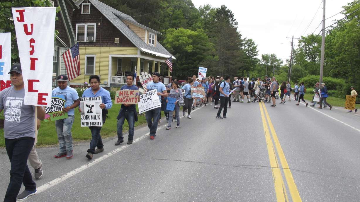 Scores of farm workers, activists march on Ben & Jerry's