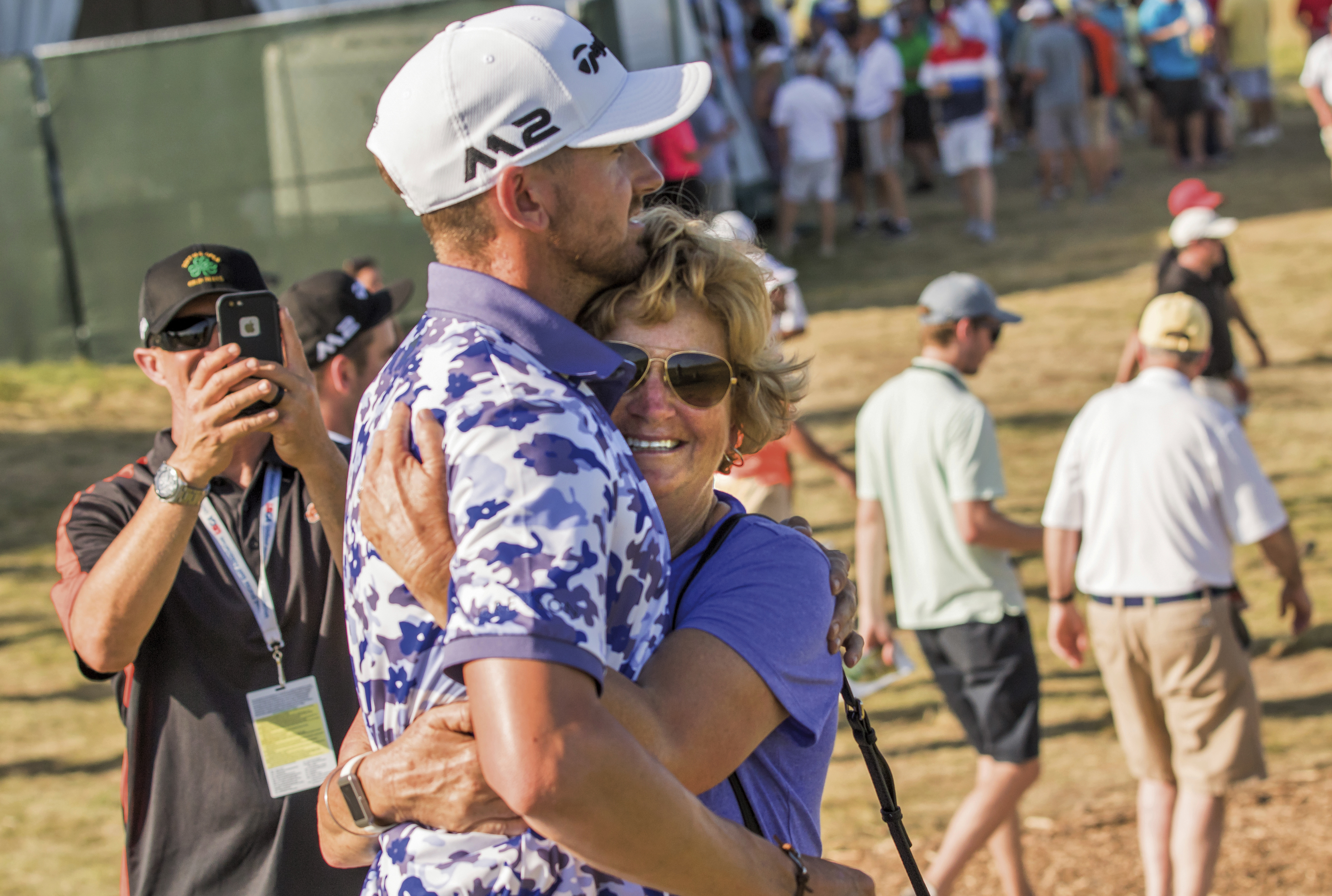 The Latest: Fleetwood, Harman trade birdies at 15 at US Open
