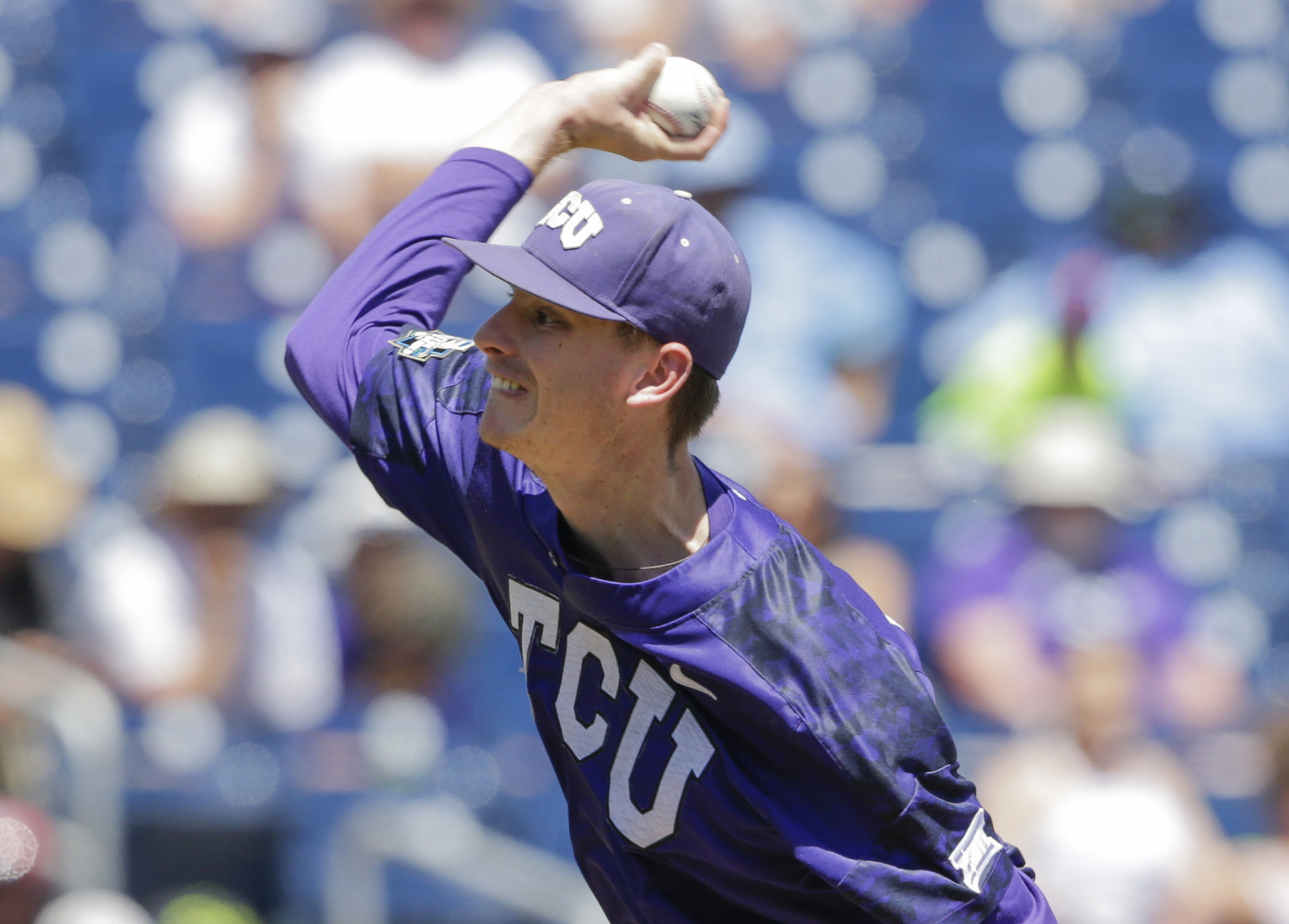 Howard's 12 Ks, Merrill HR help TCU oust Aggies from CWS 4-1