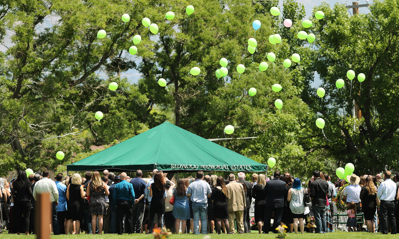 Family says goodbye to dedicated mother, spirited son killed in Sandy attack