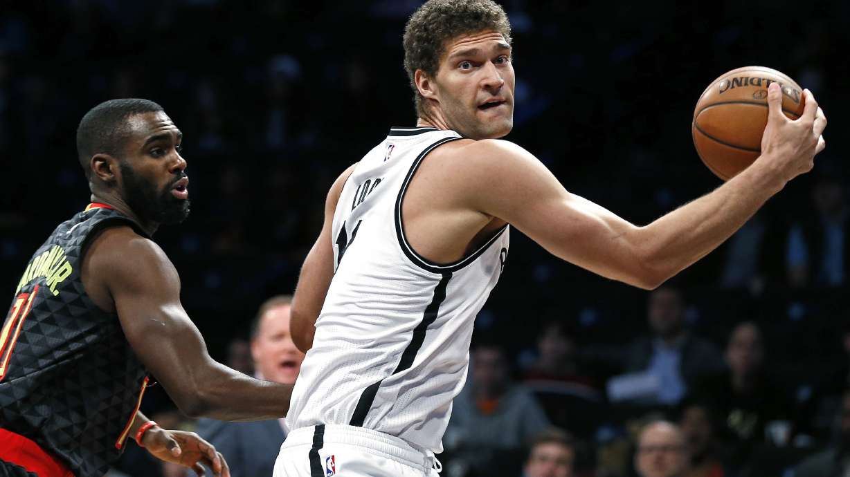 AP sources: Lakers to ship Russell, Moz to Nets for Lopez