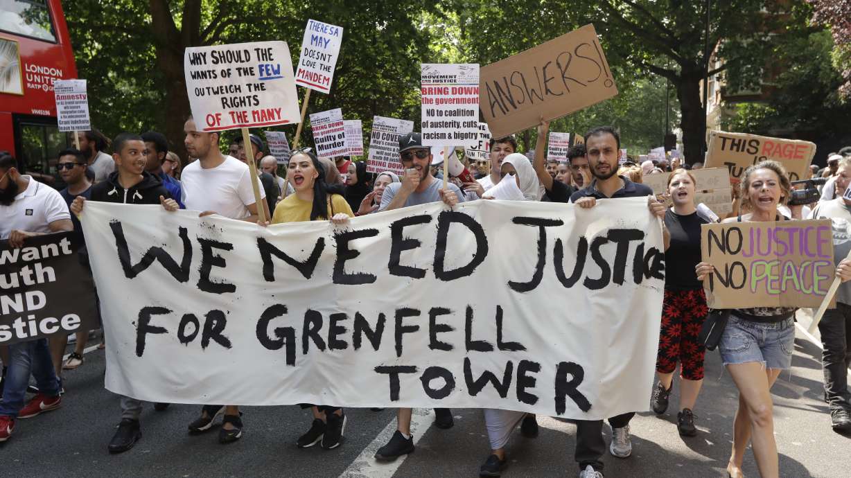 The Latest: 7 UK buildings found with combustible cladding