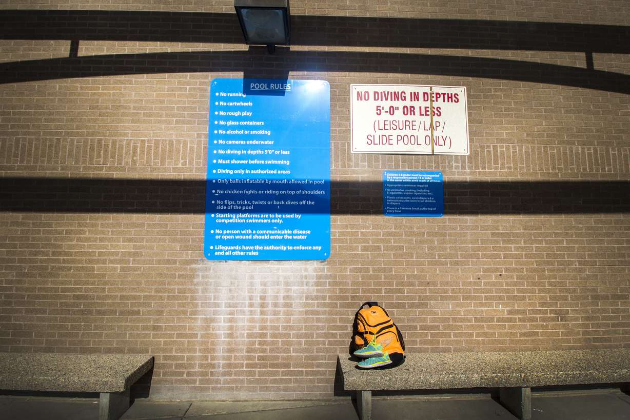 A large blue sign with the pool rules at the Cottonwood Heights Recreation Center. Cottonwood Heights Parks and Recreation Service Area director Ben Hill said a larger sign was added over the winter at the recommendation of a third-party consultant. (Photo: Carter Williams, KSL.com)