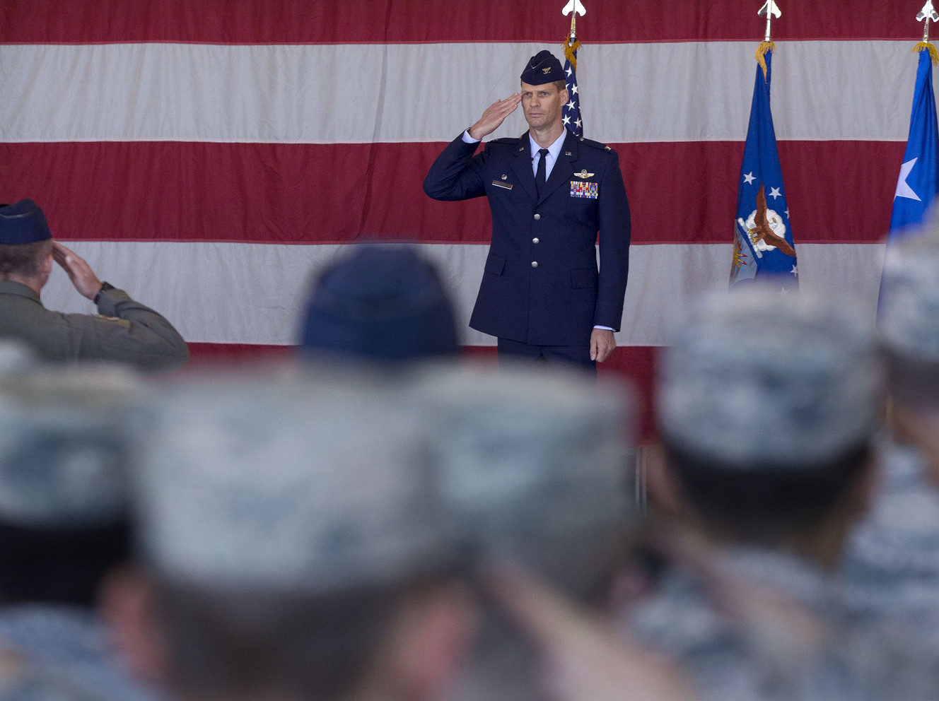 Members of the 388th Fighter Wing render the first salute to Col. Lee E. Kloos during a change of command ceremony at Hill Air Force Base on Friday, June 23, 2017. As the 388th Fighter Wing commander, Kloos will be responsible for the readiness, training, morale and welfare of 1,800 personnel who maintain and operate 70 primary assigned F-16CM and F-35A aircraft across six squadrons, as well as the Utah Test and Training Range. (Photo: Laura Seitz, Deseret News)
