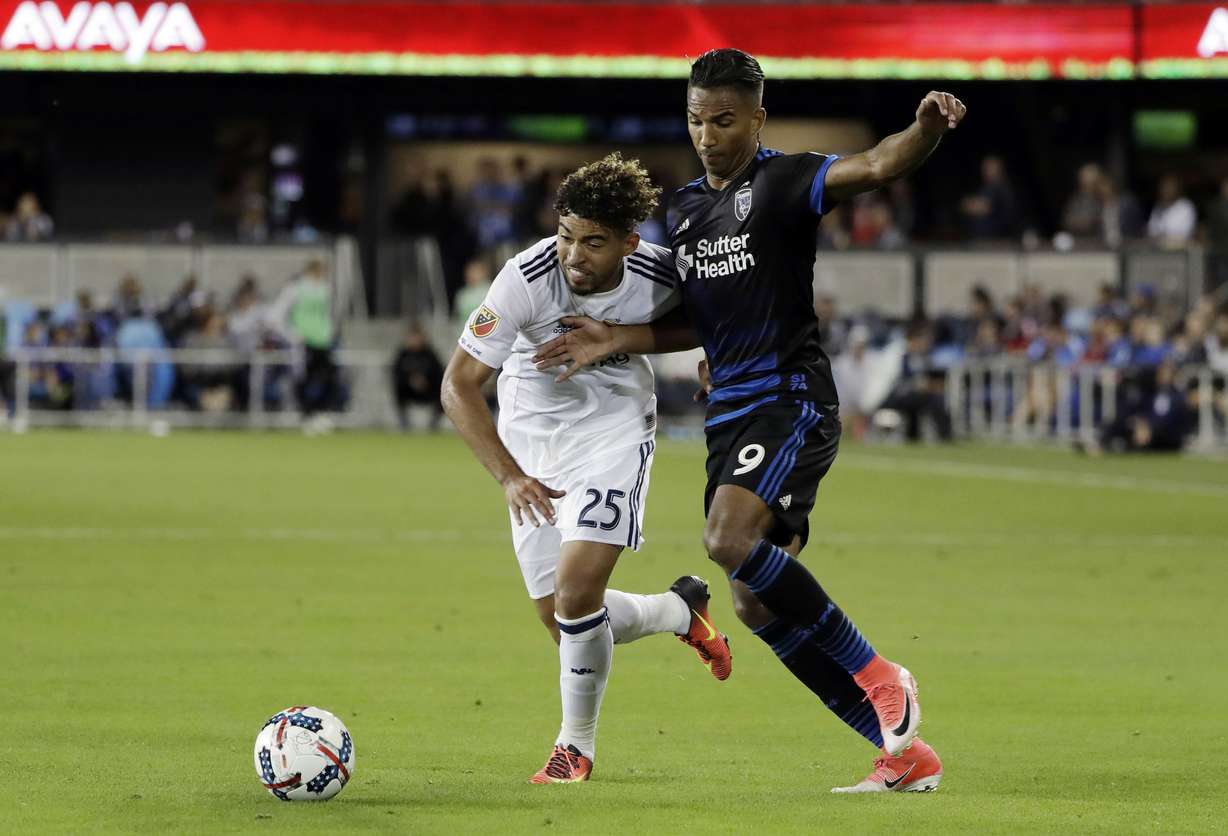 Real Salt Lake midfielder Danilo Acosta (25) is defended by San Jose Earthquakes forward Danny Hoesen (9) during the second half of an MLS soccer match Saturday, June 24, 2017, in San Jose, Calif. (Photo: Marcio Jose Sanchez, AP)