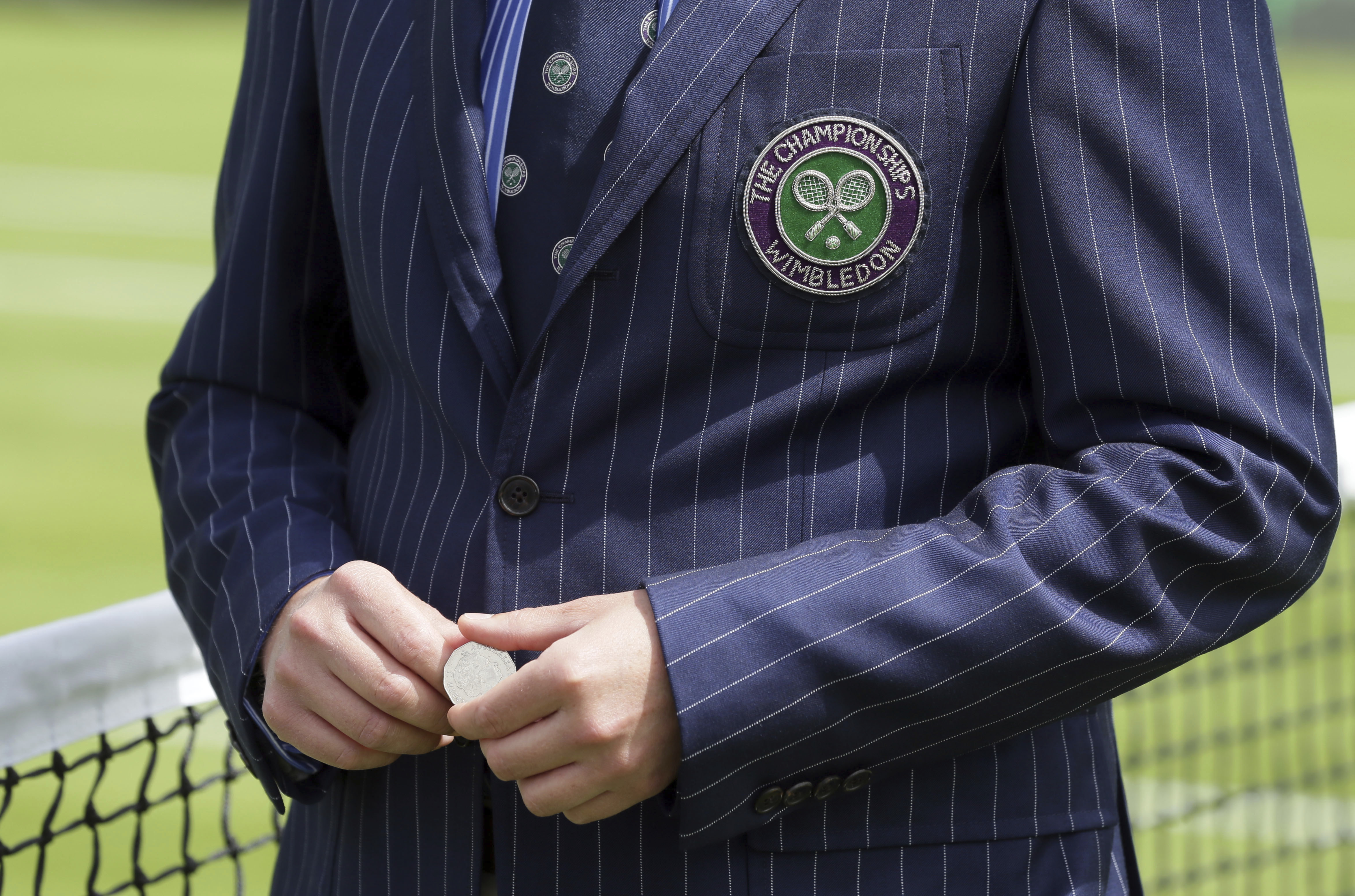 The Latest: Shapovalov gets into spat at Wimbledon