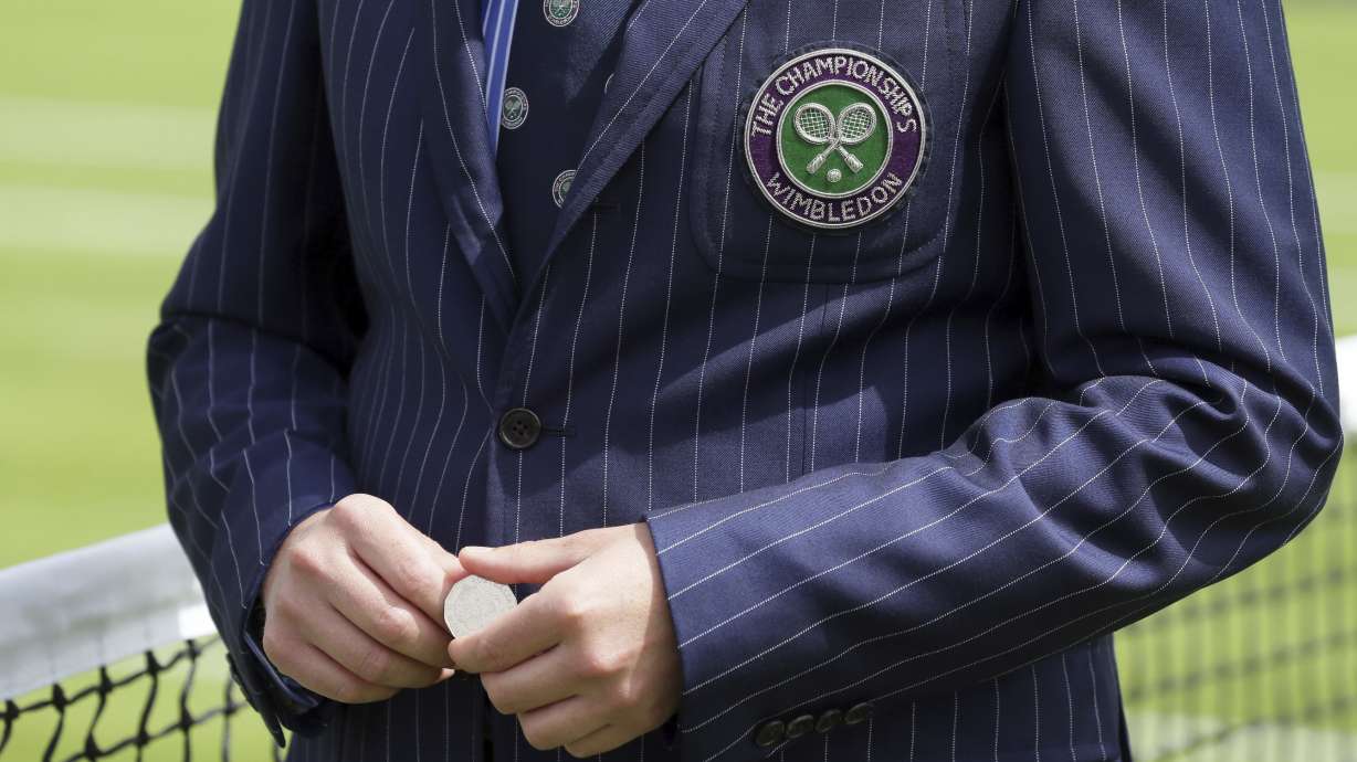 The Latest: Shapovalov gets into spat at Wimbledon