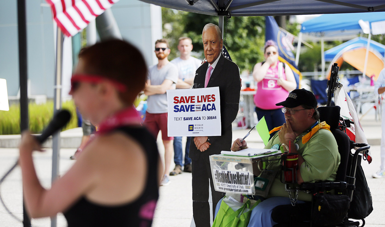 Demonstrators hold all-day sit-in near Hatch, Lee offices to oppose health care bill