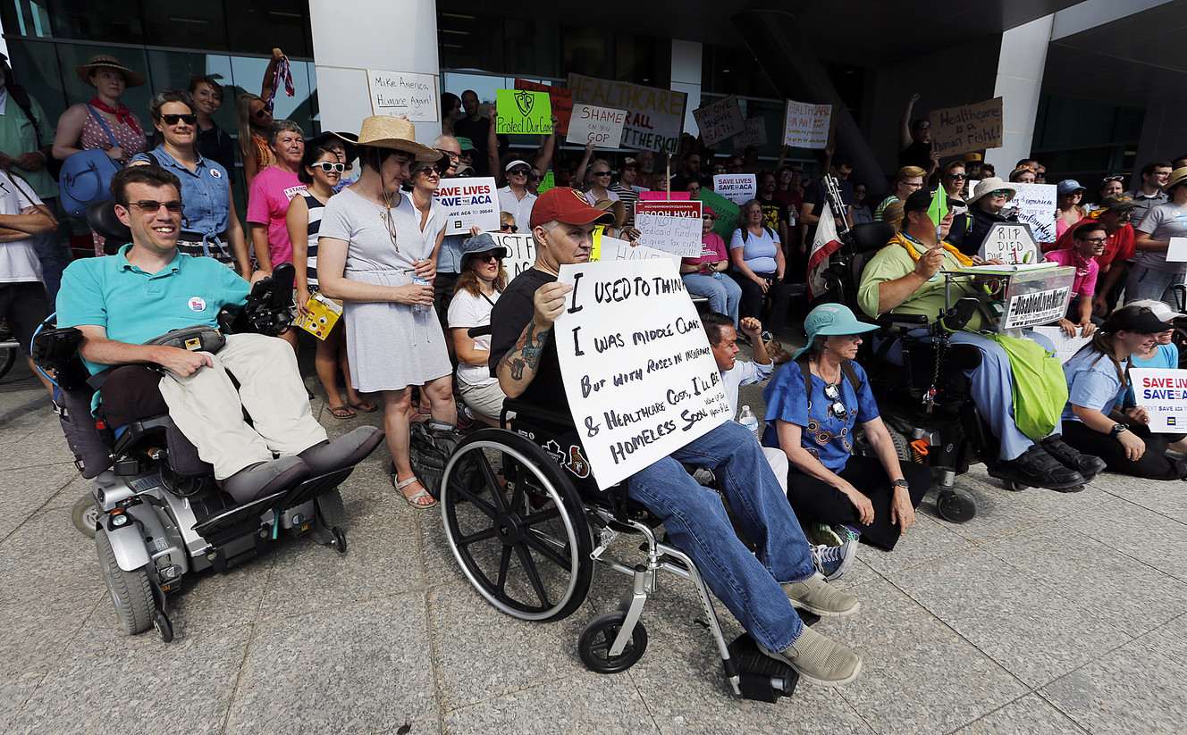 Health care advocates rally against the Better Care Reconciliation Act at the Wallace F. Bennett Federal Building in Salt Lake City on Thursday, July 6, 2017. (Photo: Ravell Call, Deseret News)