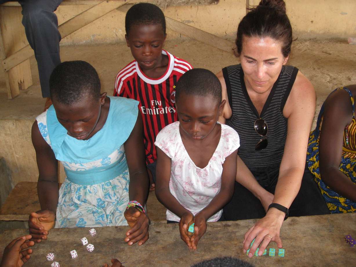 Michele Bennett, director of physician staff services at the Medical Review Institute of America, visits Ghana in 2015. The Salt Lake firm holds an annual fundraiser to provide hygiene kits and school supplies for communities in rural Ghana. This year the firm is asking disgruntled Gordon Hayward fans to donate jerseys, shirts and other memorabilia from the former Utah Jazz All-Star. (Photo: Medical Review Institute of America)