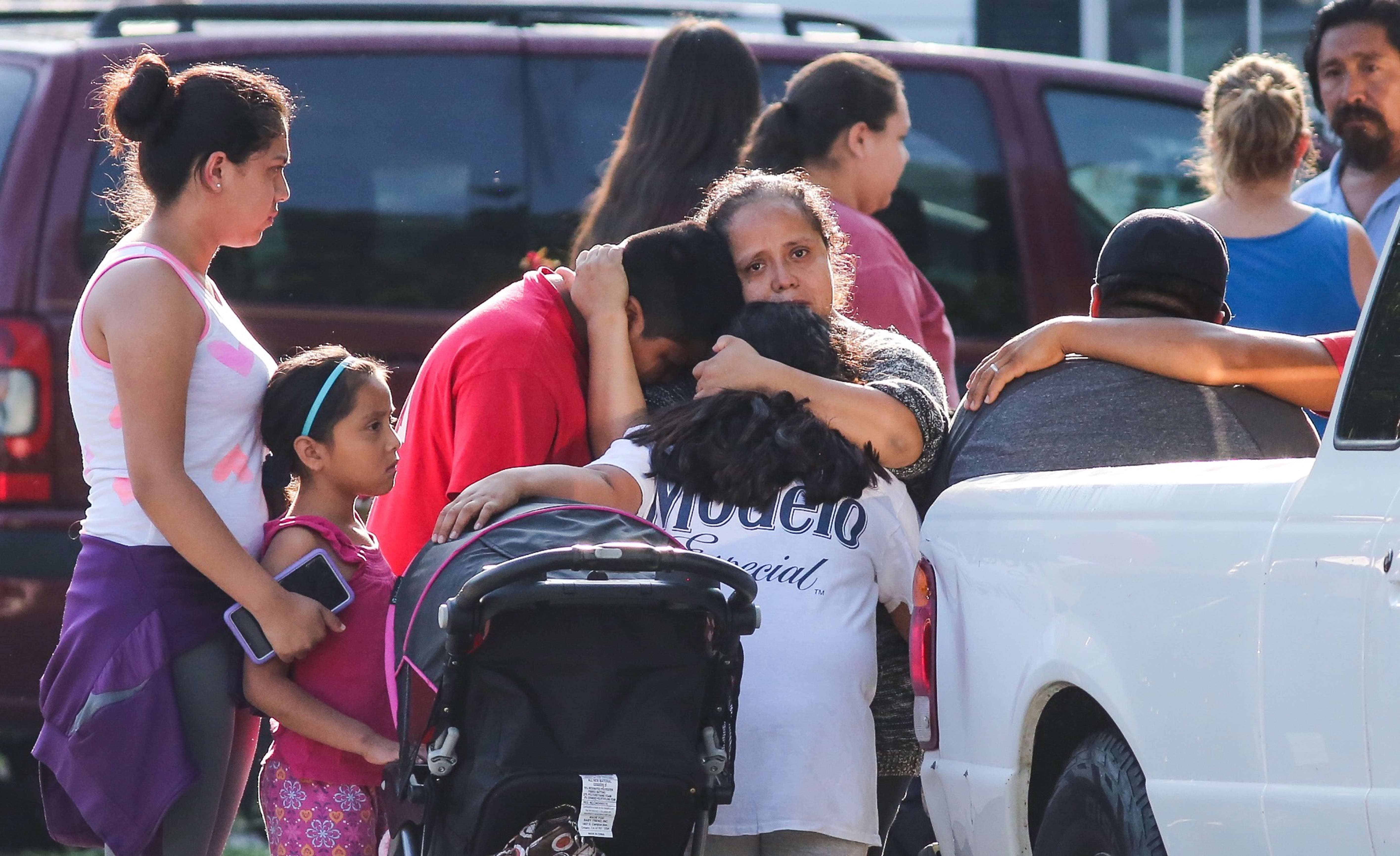 The Latest: Mom charged in kids' deaths in country illegally