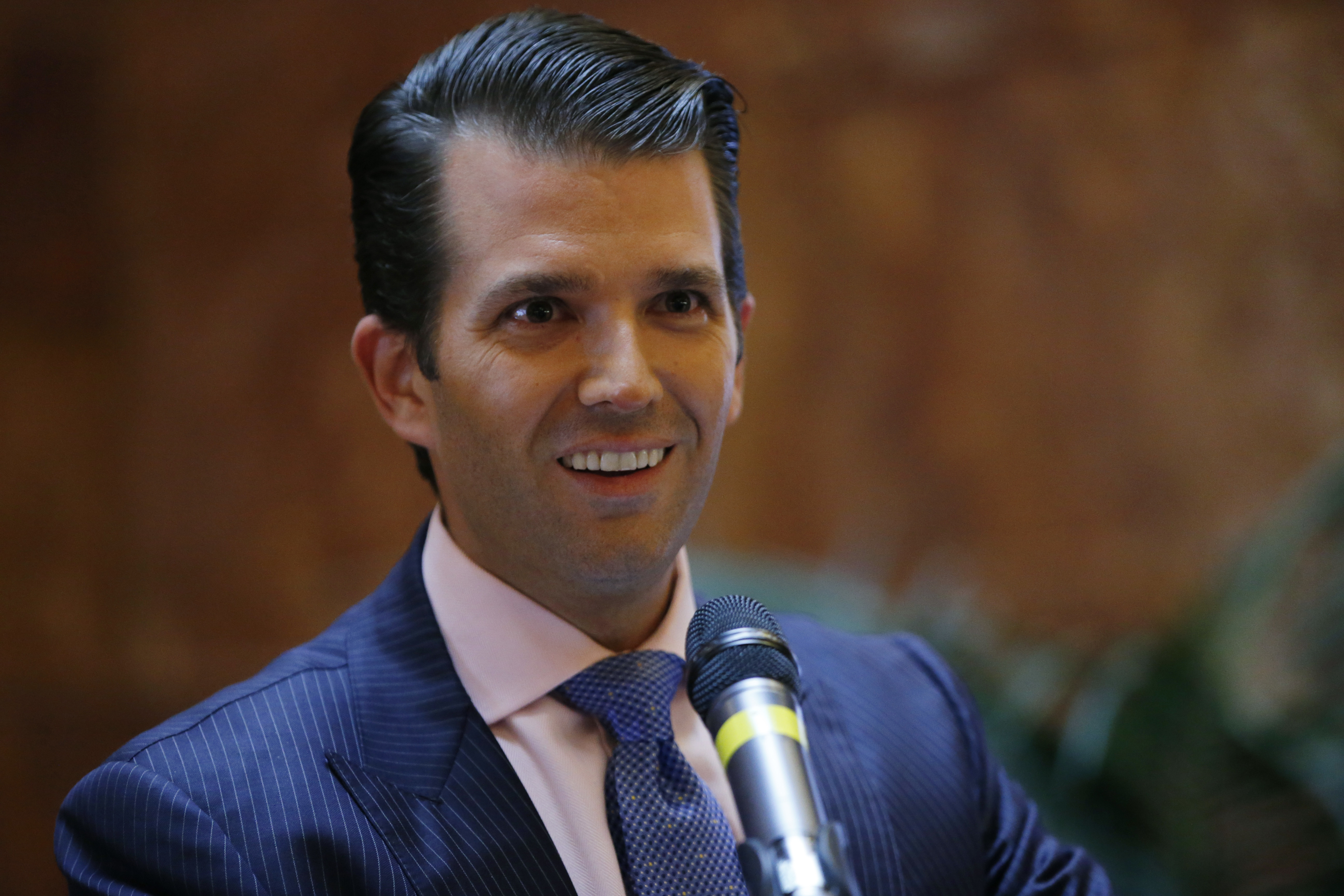 Trump Jr. tweets 'Top Gun' video of dad shooting CNN jet