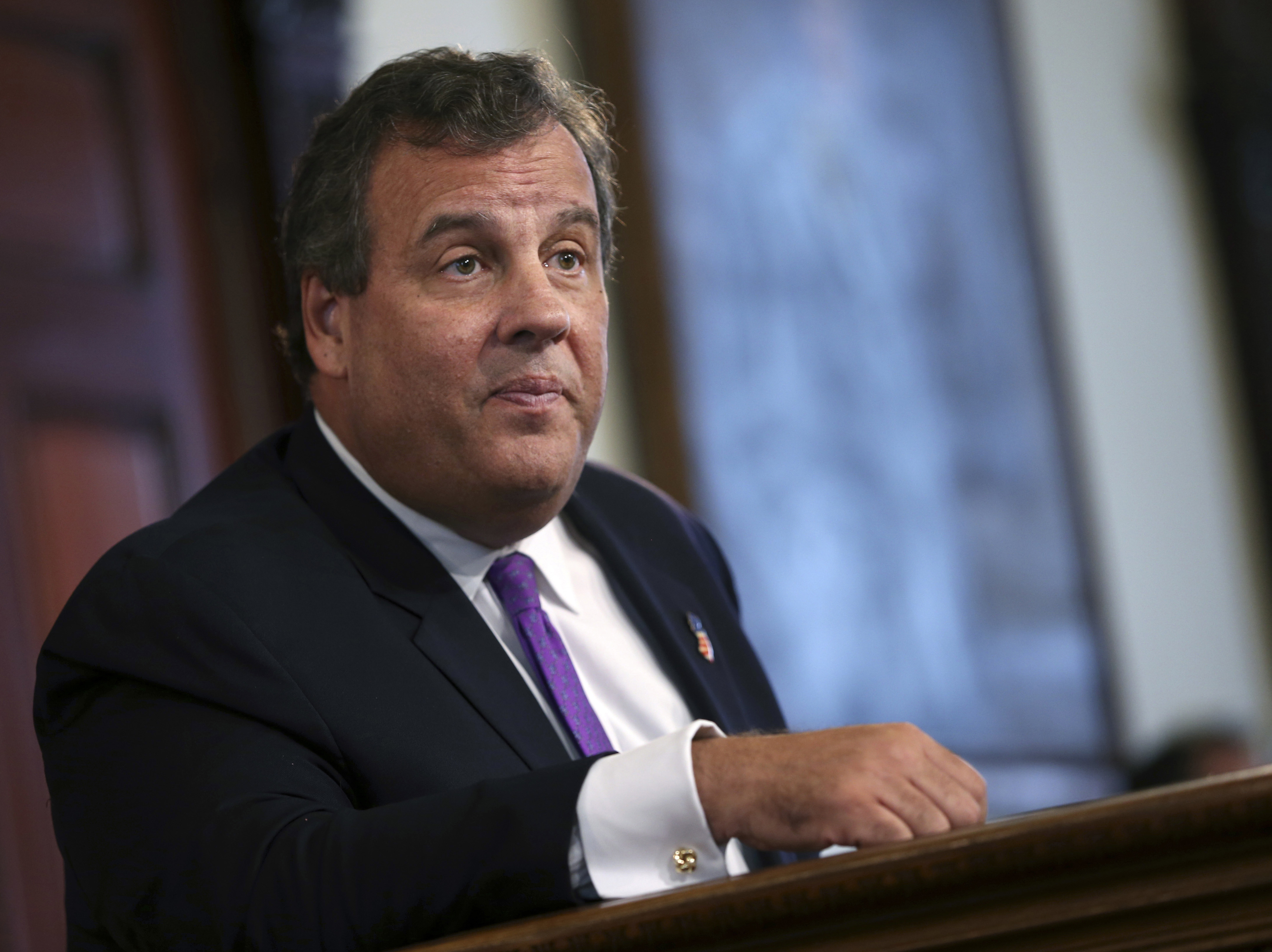 Unpopular Christie turns to sports talk, calls fan 'a bum'