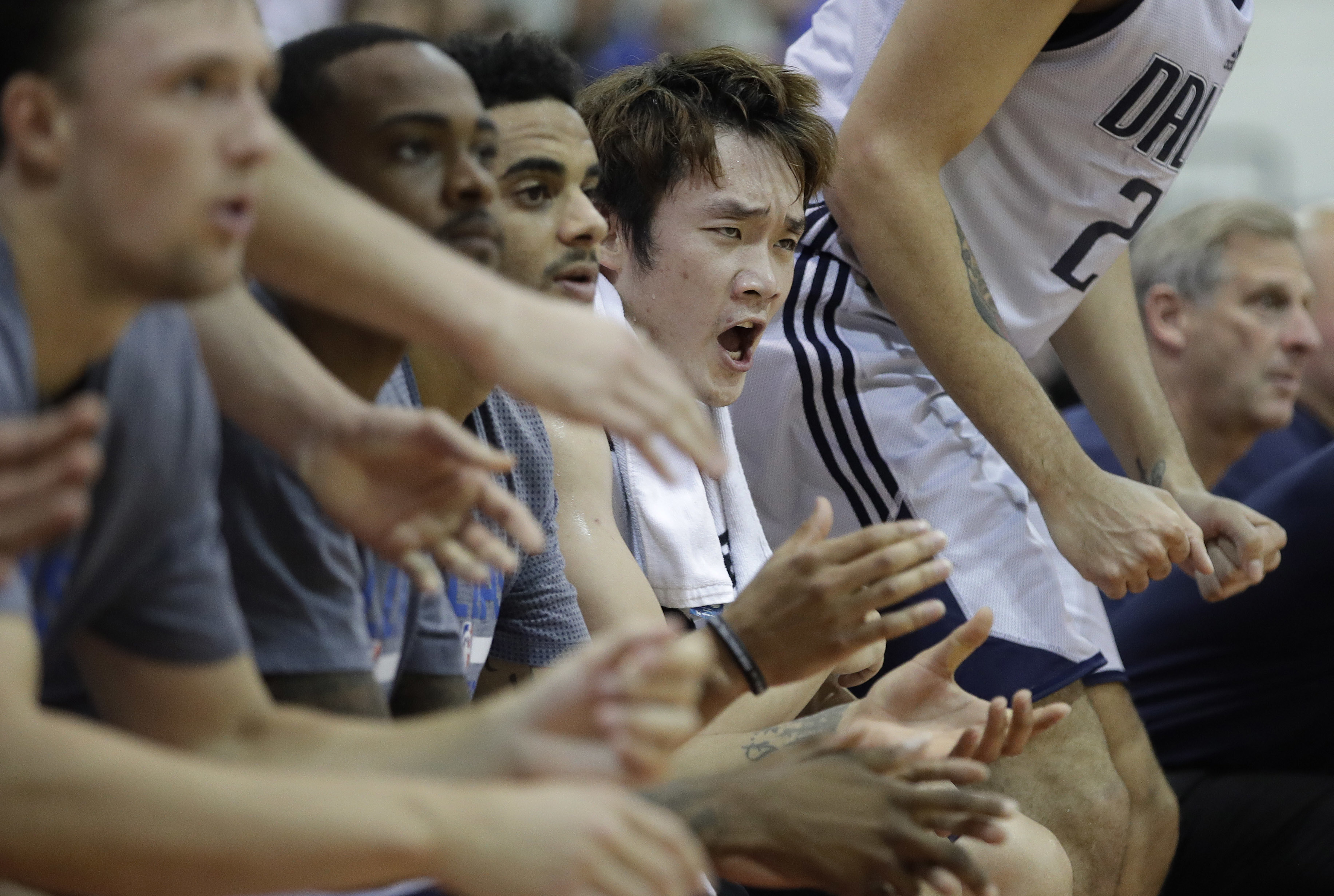 China's Ding, Zhou make strong impressions at summer league
