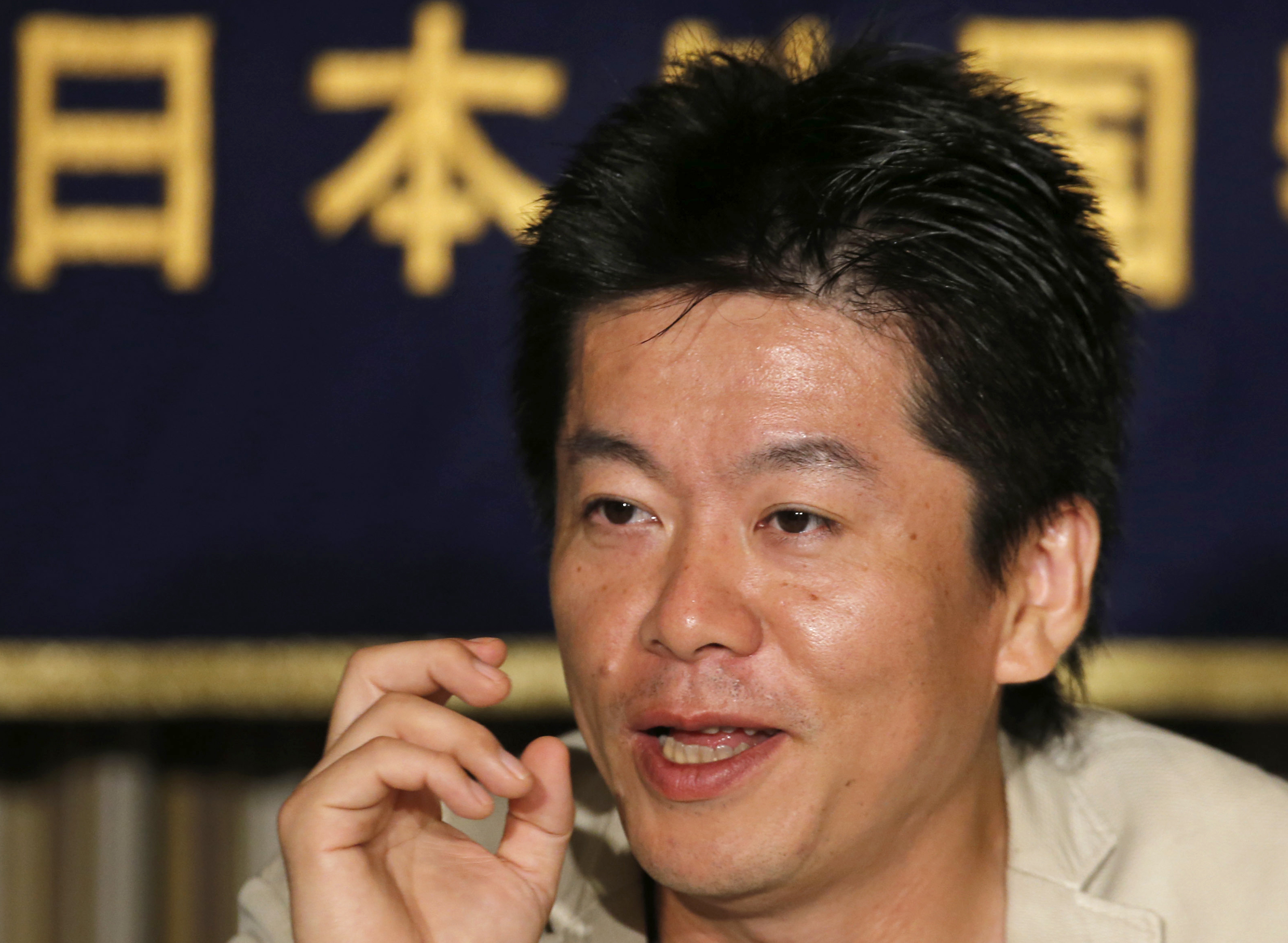 Japan TV sorry over Hitler T-shirt worn by talk show guest