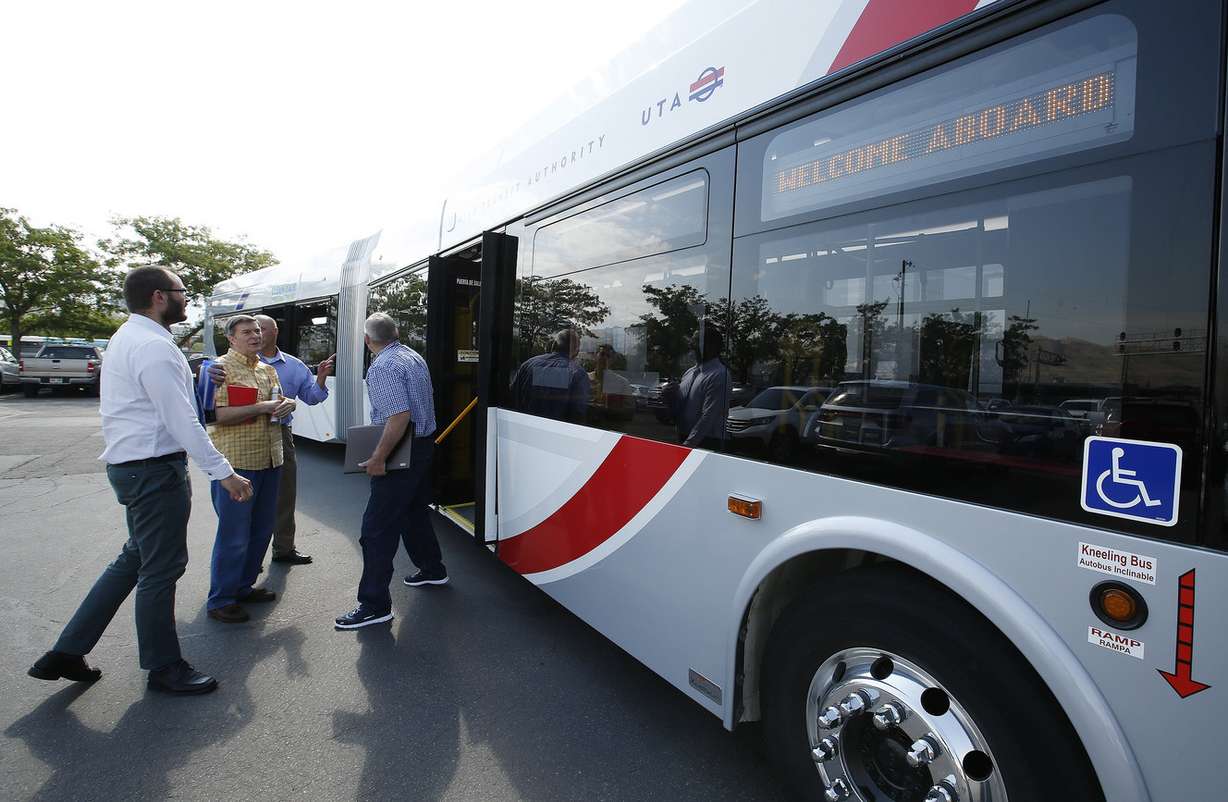 Utah Transit Authority employees look over the New Flyer Xcelsior 60-foot articulated bus in Salt Lake City on Friday, July 14, 2017. The bus is powered by a clean-air diesel-electric hybrid motor and can hold up to 80 passengers. (Photo: Jeffrey D. Allred, Deseret News)