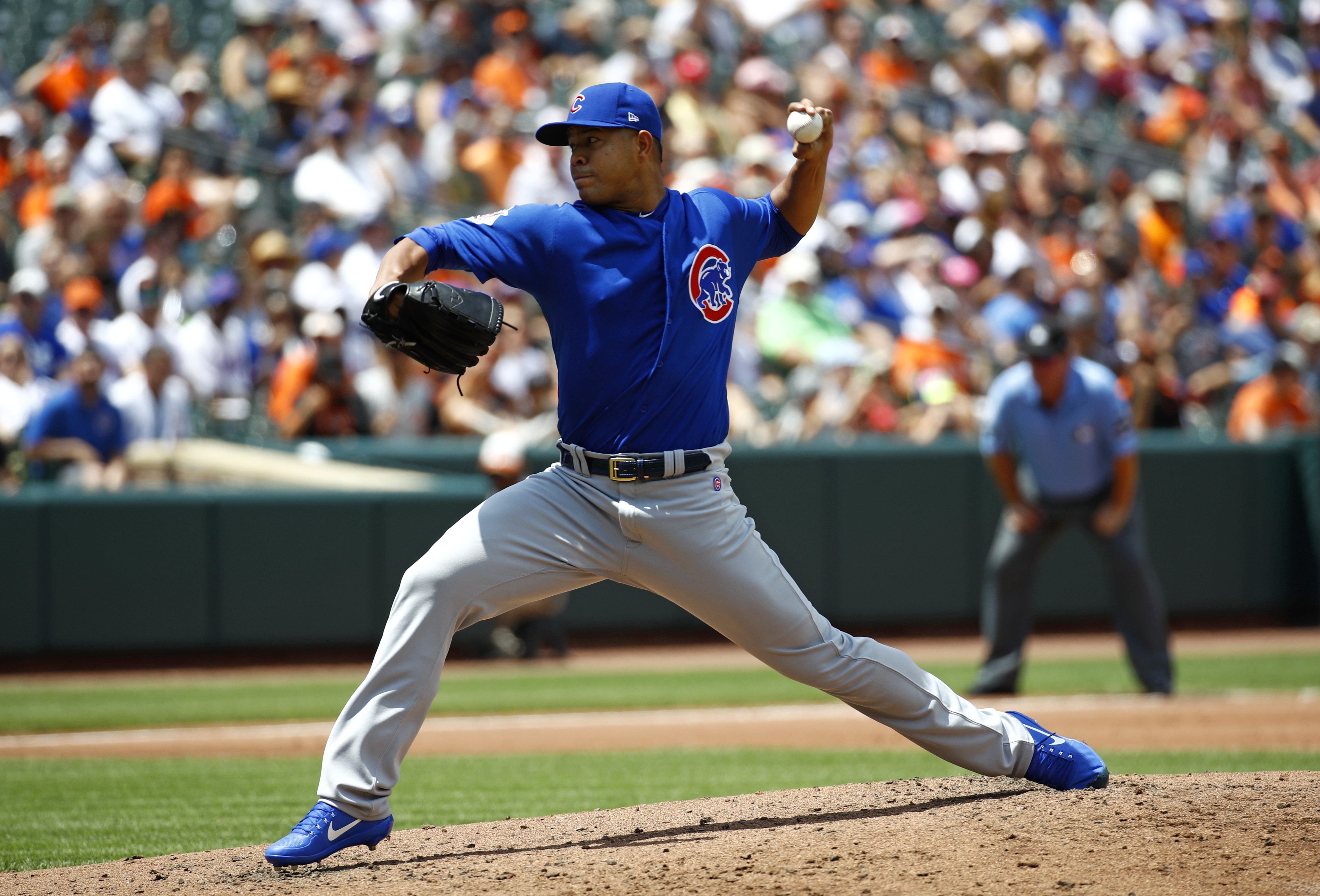 Quintana dazzles in Cubs debut, fans 12 to beat Orioles 8-0