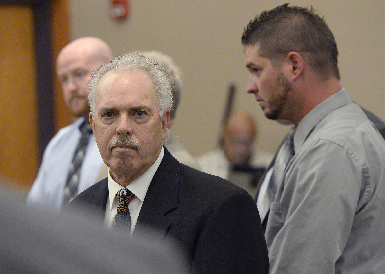 Ex-sheriff, 2 deputies make first court appearance in abuse case