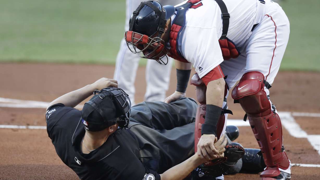 Home plate umpire Chris Segal hit by Josh Donaldson's bat