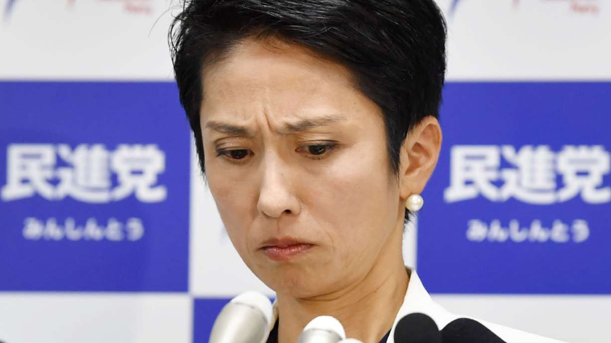 Japan lawmaker shows legal records to prove nationality