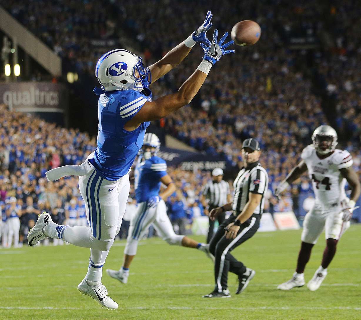 BYU wide receiver Moroni Laulu-Pututau (1) reaches makes a reception for a touch down as BYU and Mississippi State play in Provo at LaVell Edwards Stadium on Friday, Oct. 14, 2016. (Photo: Scott G Winterton, Deseret News)