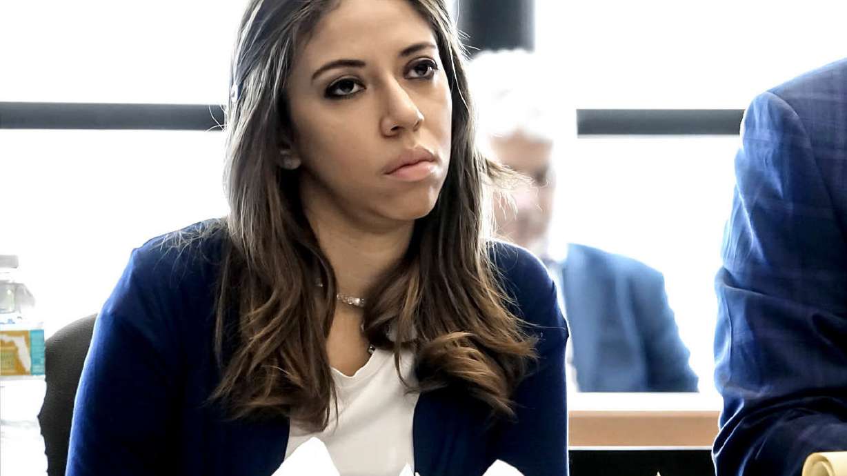 Former Florida escort sentenced to 16 years in prison for trying to hire hit man to kill her newlywed husband.