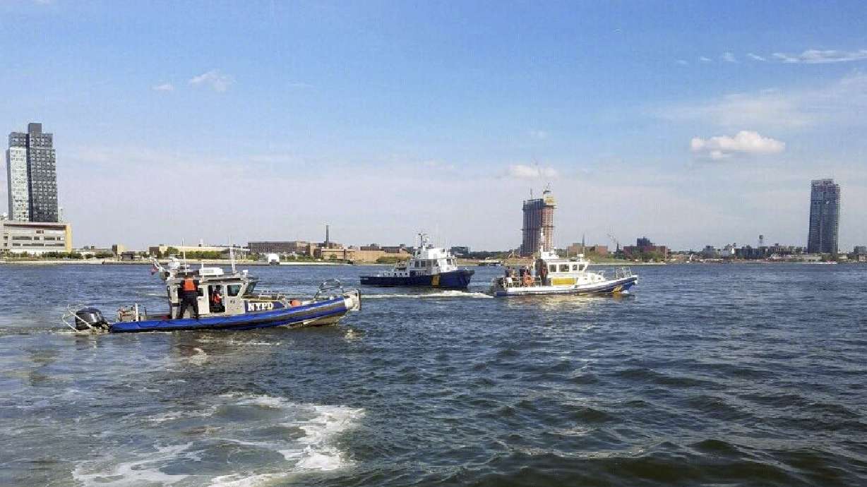 Small seaplane makes hard landing in NY's East River.
