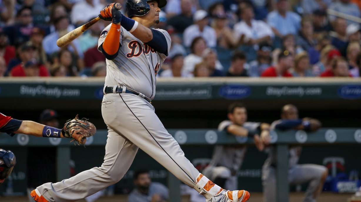 Martinez goes deep twice, Tigers top Twins 6-3