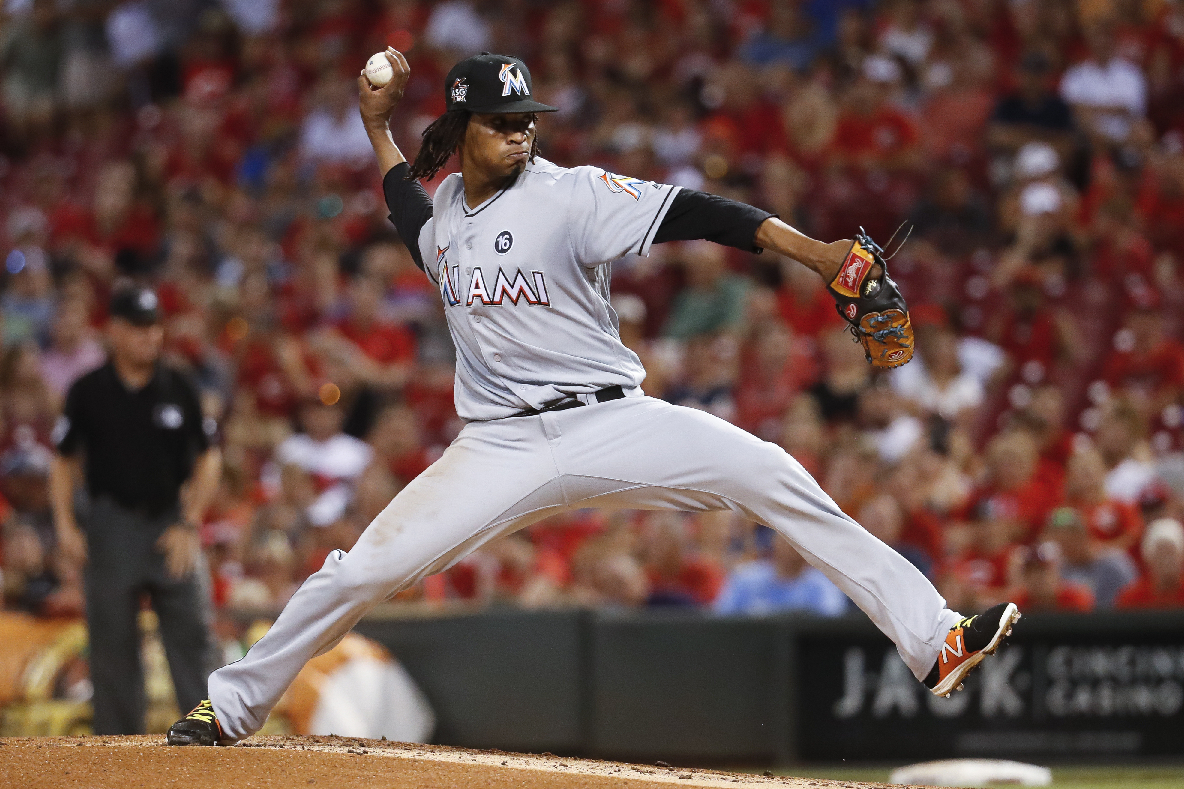 After rain delay, Urena pitches Marlins to 3-1 win over Reds