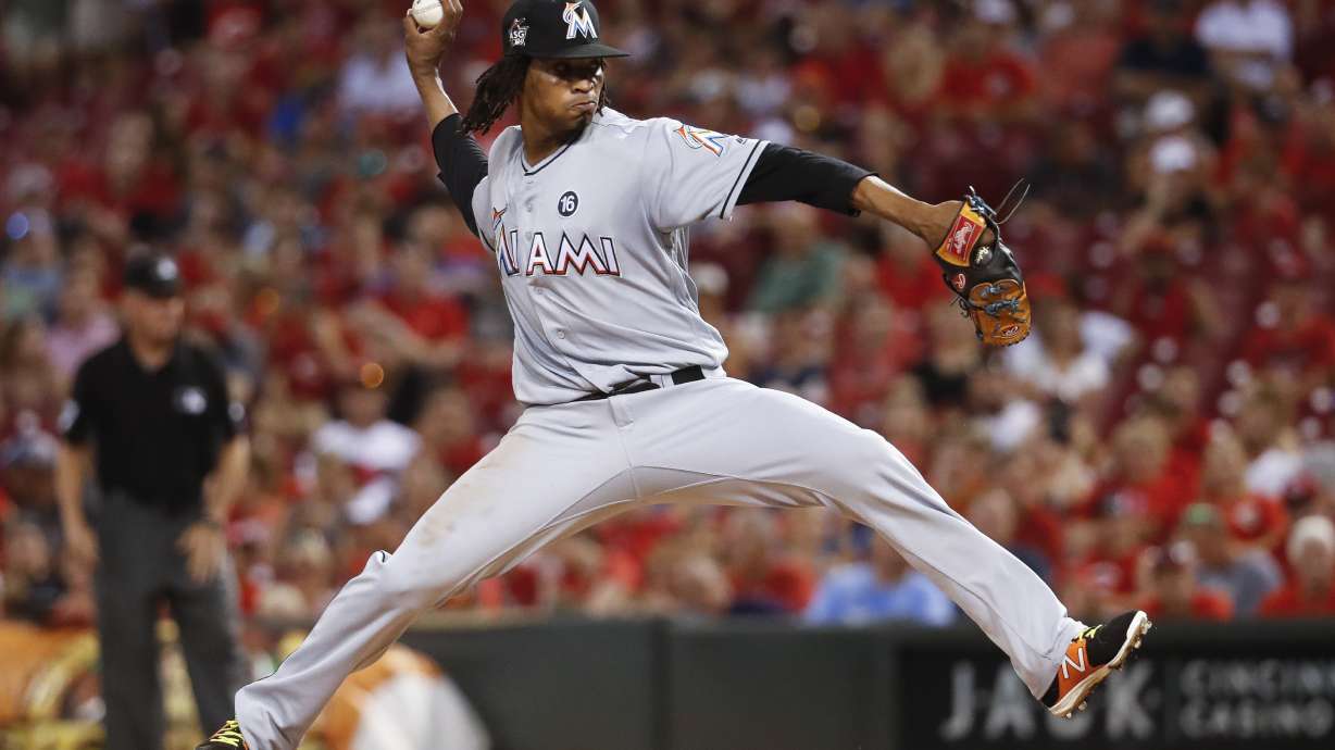 After rain delay, Urena pitches Marlins to 3-1 win over Reds