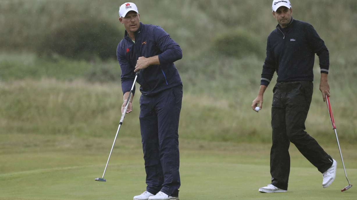 The Latest: Spieth will take a 3-shot lead into final round
