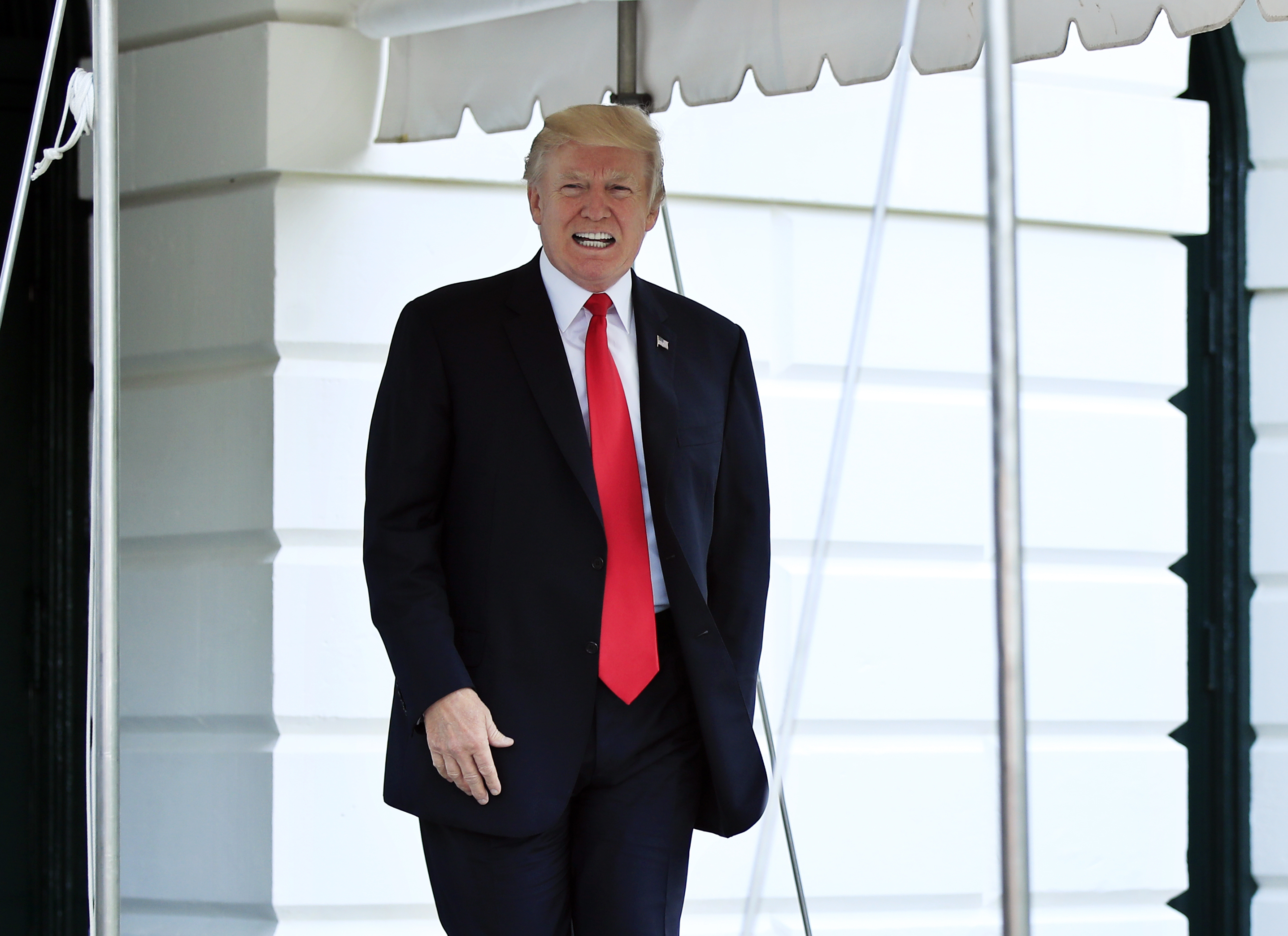 Trump asserts all agree he has 'complete power' to pardon