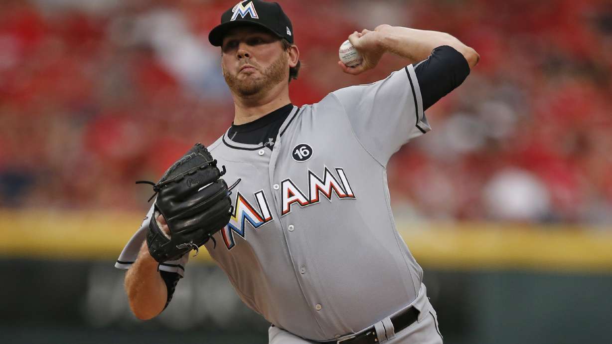 JT Realmuto homers twice, Marlins beat slumping Reds 5-4