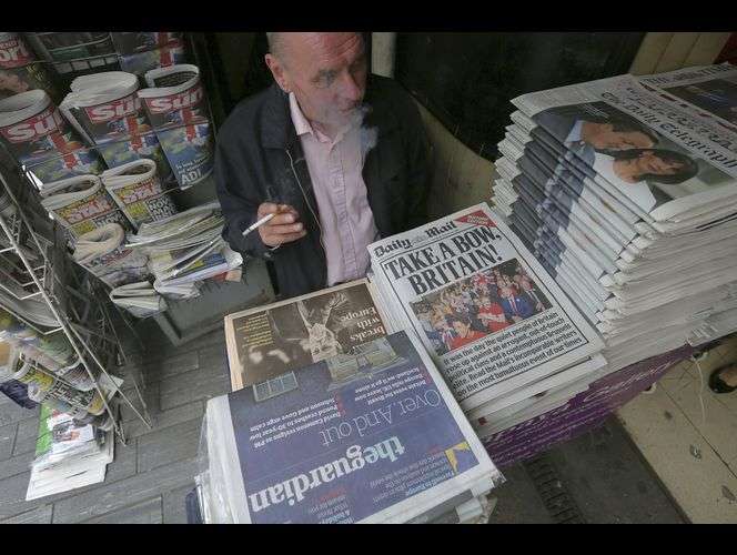 FILE - In this Saturday, June 25, 2016 file photo, the front pages of Britain's newspapers report on the EU referendum result, London. (Photo: Tim Ireland, Associated Press, File)