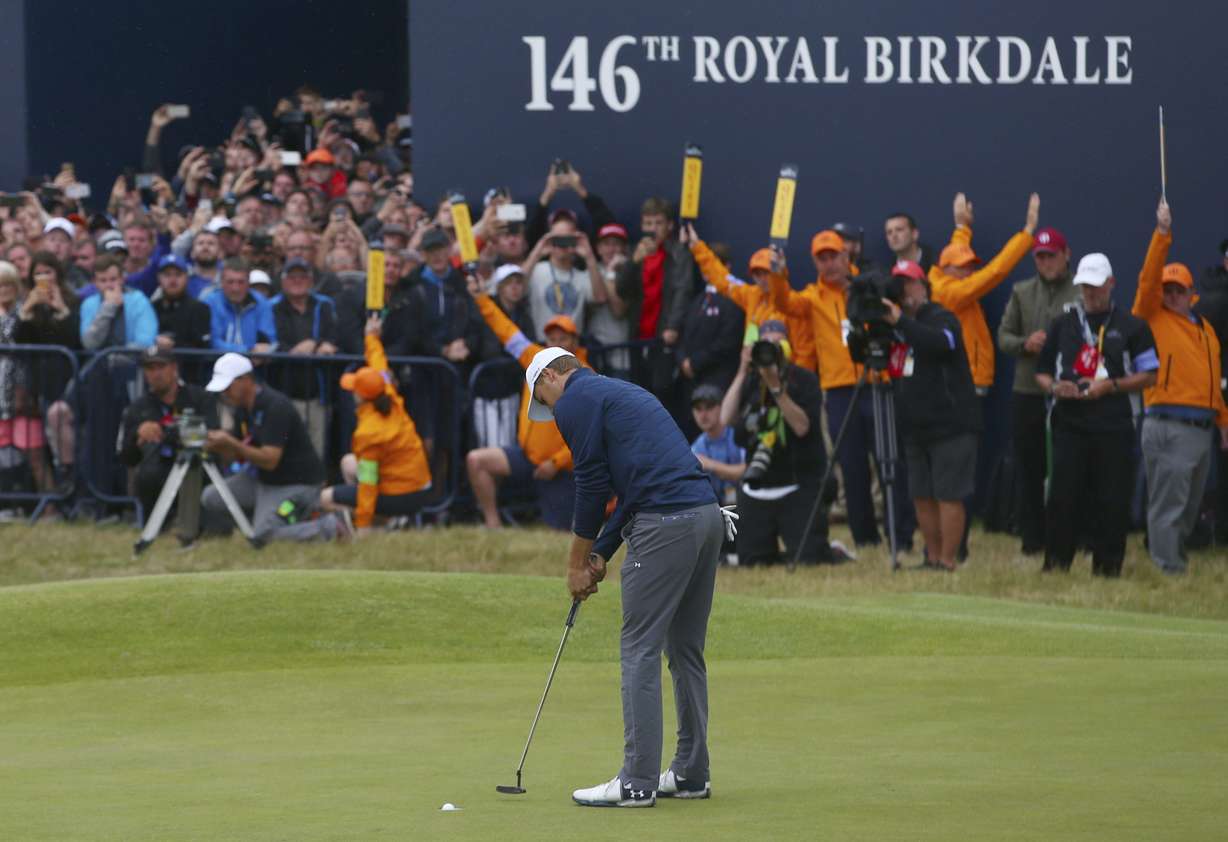 Jordan Spieth of the United States putts to win the British Open Golf Championship, at Royal Birkdale, Southport, England, Sunday July 23, 2017. (AP Photo/Dave Thompson)