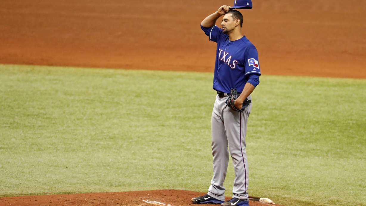 Odor homers twice, Rangers sweep Rays with 6-5 win