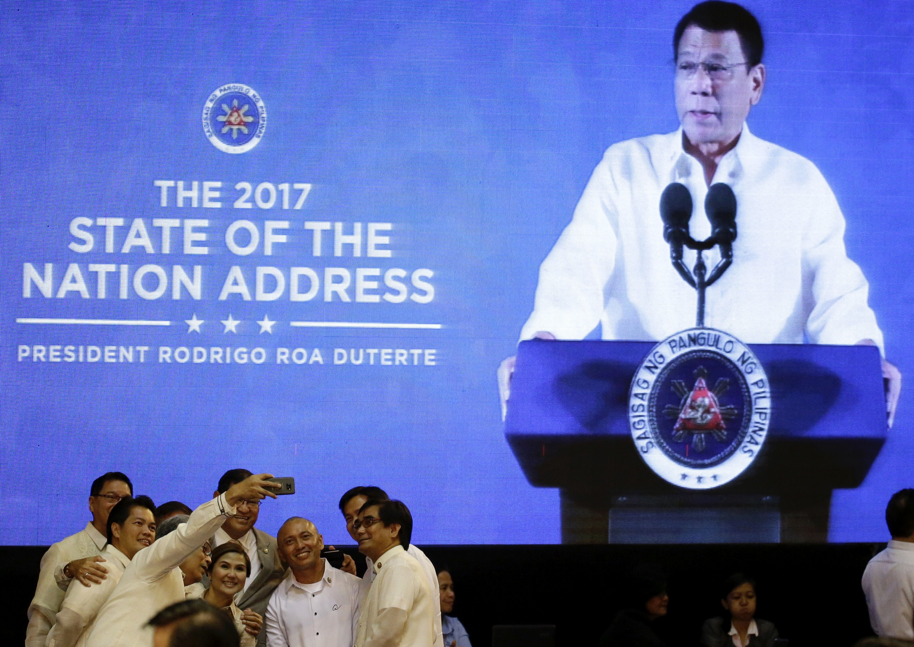 Duterte vows end to uprising, 'jail or hell' in drug war