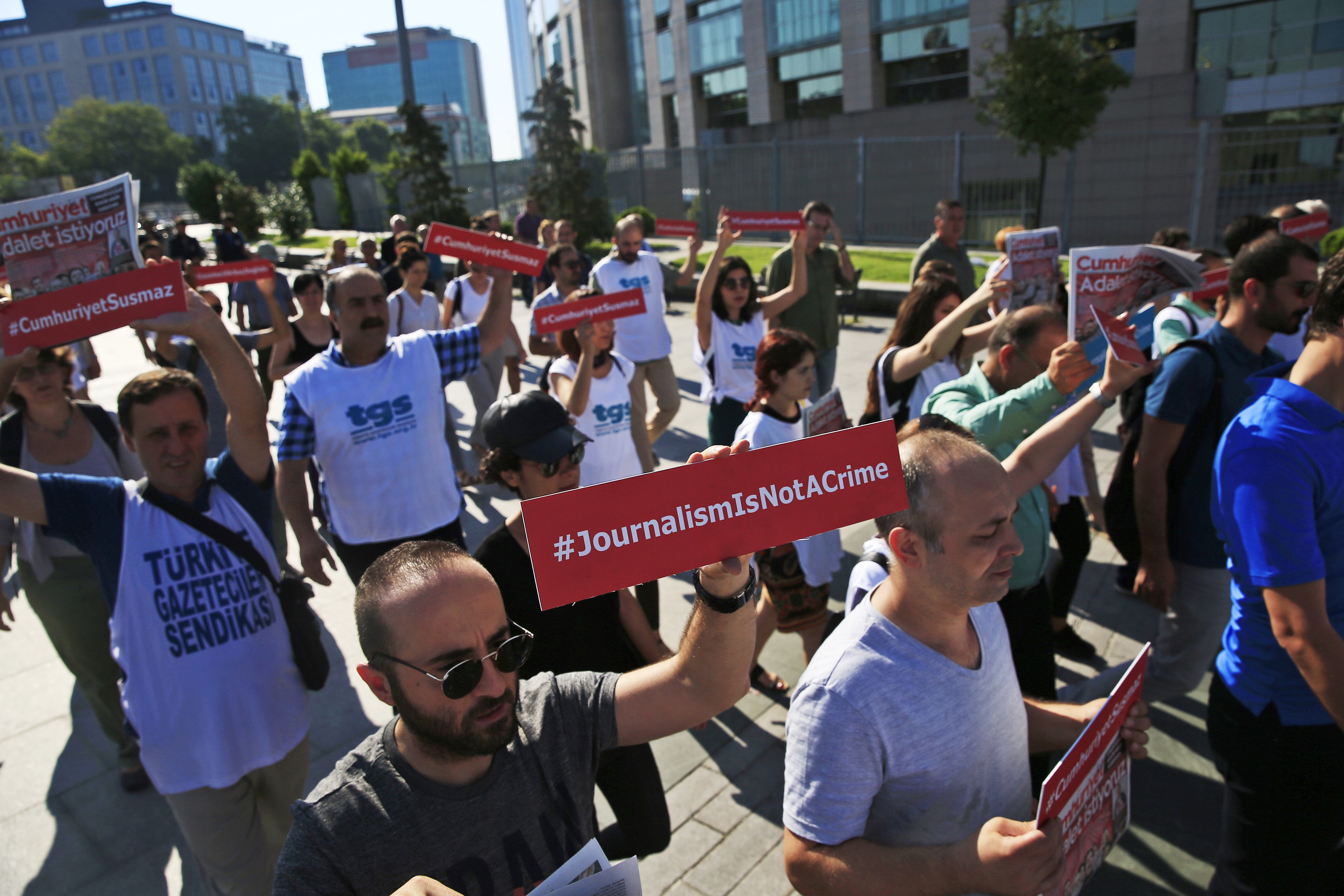 Turkish opposition journalists on trial for aiding 'terror'