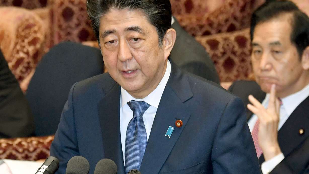 Lawmakers accuse Japan's Abe of false testimony in scandal
