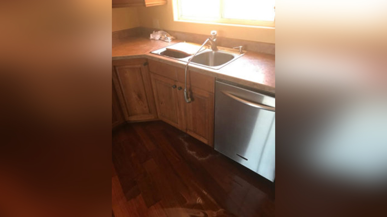 This photo, provided by the Styler family, shows some of the aftermath from vandalism-caused flooding in the home they are trying to sell. (Photo: Styler Family)