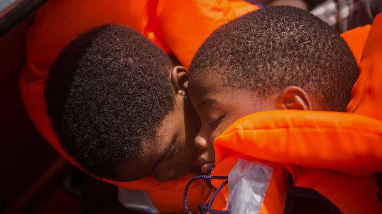The Latest: 13 dead migrants found on boat in Mediterranean
